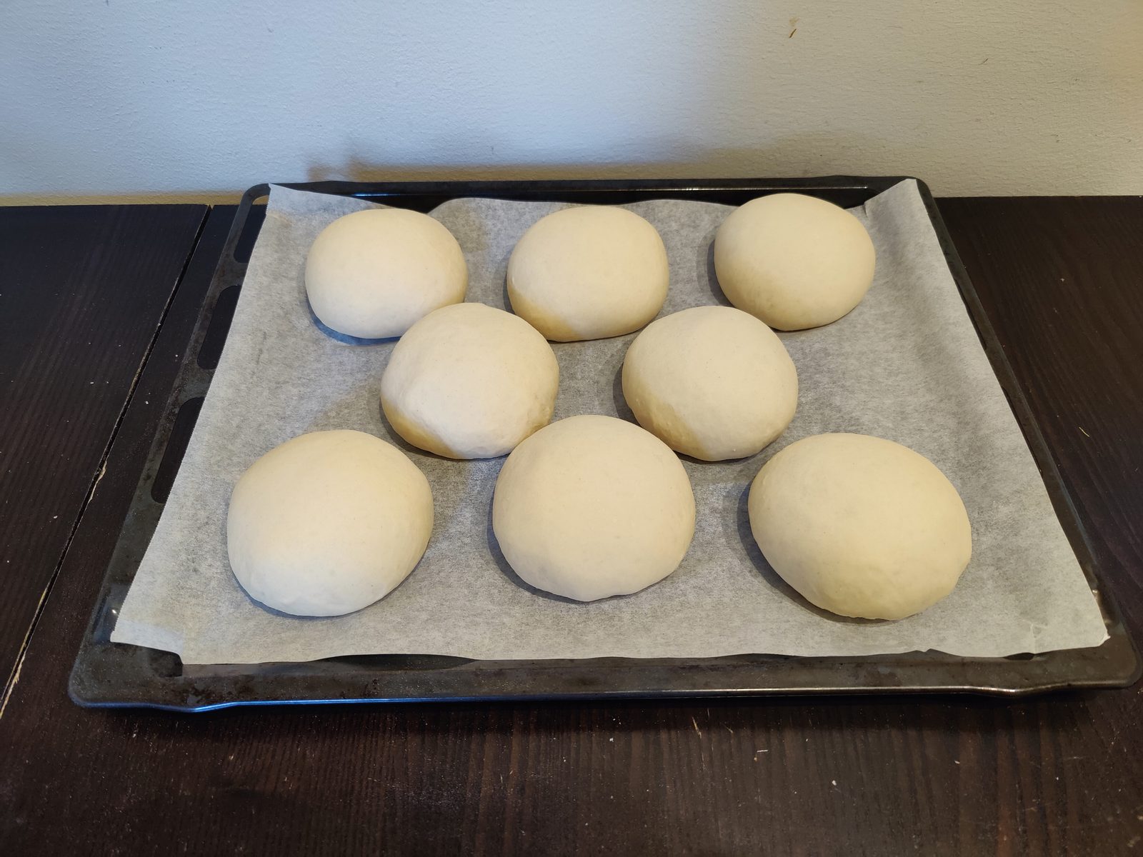 The risen buns, ready to bake