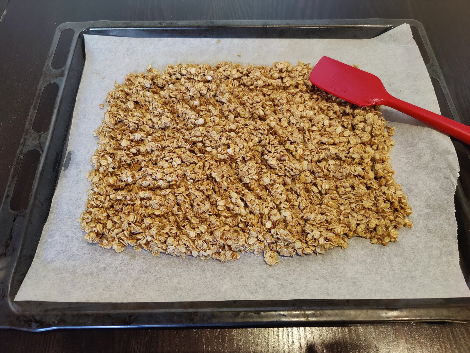 The granola spread on the tray